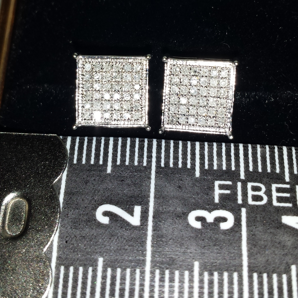 14k white gold Diamond square studs.
